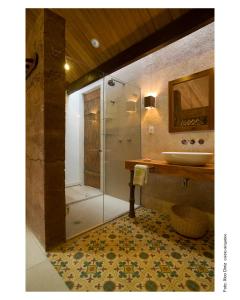 Um banheiro em Hotel de Lençois