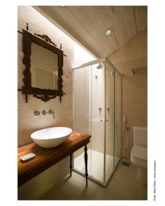Um banheiro em Hotel de Lençois