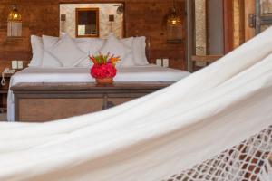 Cama ou camas em um quarto em Hotel de Lençois