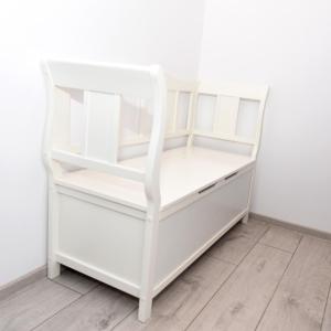 a white book shelf against a white wall at Best Apartment Suceava in Suceava