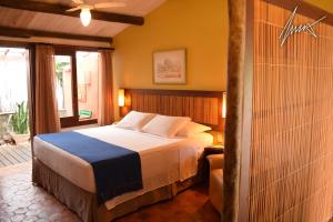 Cama ou camas em um quarto em Hotel de Lençois