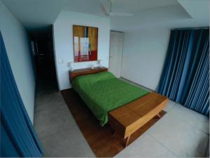 Astangra Residence tesisinde bir odada yatak veya yataklar
