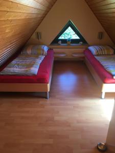 Кровать или кровати в номере Ferienappartements Anke Lange