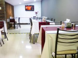 Posezení v ubytování Hostal El Roble