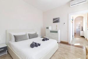 Posteľ alebo postele v izbe v ubytovaní Residence Giulietta