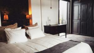 Posteľ alebo postele v izbe v ubytovaní B&B La Mimosa
