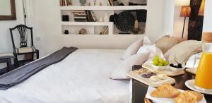 Posteľ alebo postele v izbe v ubytovaní B&B La Mimosa