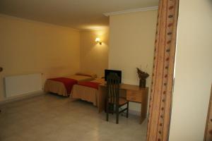 Posteľ alebo postele v izbe v ubytovaní Hotel La Brañina