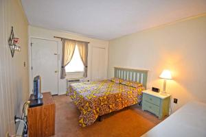 Postel nebo postele na pokoji v ubytování Severn I 208