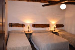 Postel nebo postele na pokoji v ubytování Finca El Carmen + 65 fotografií
