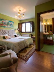 Posteľ alebo postele v izbe v ubytovaní Casa Ramiras