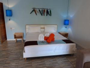 Voodi või voodid majutusasutuse Padel Phangan Suite toas