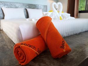Voodi või voodid majutusasutuse Padel Phangan Suite toas