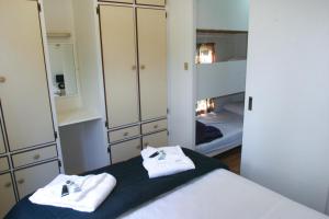 
A bed or beds in a room at Ingenia Holidays Shoalhaven Heads

