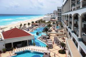 an aerial view of a resort with a beach at Hyatt Zilara Cancun - All Inclusive - Adults Only in Cancún