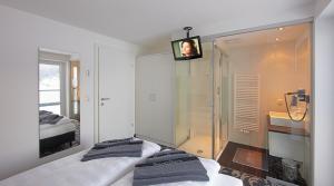 Voodi või voodid majutusasutuse Ischglliving Family Appartements toas