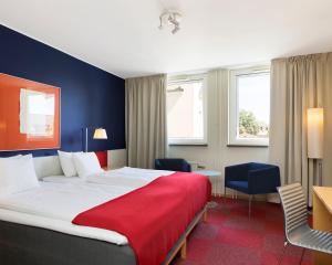 Postel nebo postele na pokoji v ubytování ProfilHotels President + 22 fotografií