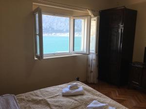 Postel nebo postele na pokoji v ubytování Apartments Vila Marija