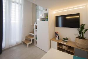 A television and/or entertainment centre at Little House