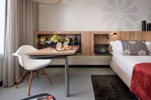 Cama o camas de una habitación en Inspira Liberdade Boutique Hotel