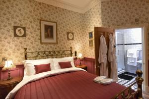 Katil atau katil-katil dalam bilik di The Aston Tavern