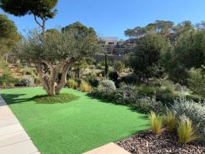 A garden outside Villa las Colinas Golf Resort