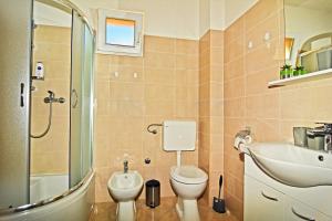 Koupelna v ubytování Apartman Nina + 23 fotografií