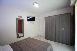 Μια τηλεόραση ή/και κέντρο ψυχαγωγίας στο Residence Villa Principe