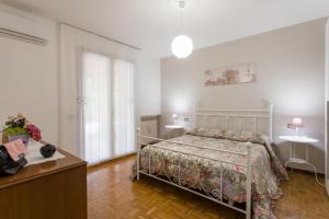 Postel nebo postele na pokoji v ubytování Casa Renalda