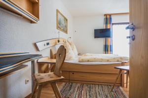 TV a/nebo společenská místnost v ubytování Gasthof Kornbachtal