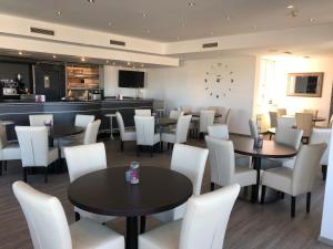 Ein Sitzbereich in der Unterkunft Skycity Hotel Atrigon