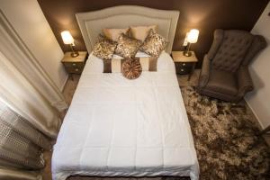 
Ένα ή περισσότερα κρεβάτια σε δωμάτιο στο Volos Home
