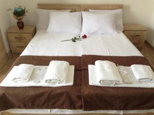 Voodi või voodid majutusasutuse Hotel Continental toas