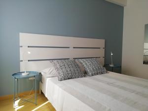 Letto o letti in una camera di B&B Dalla Nonna