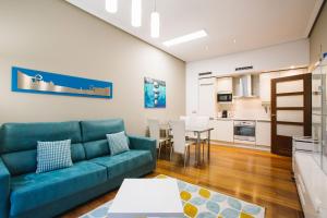 Kuchyňa alebo kuchynka v ubytovaní Apartamentos San Marcial 28