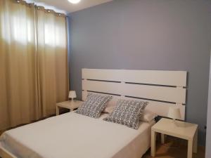 Letto o letti in una camera di B&B Dalla Nonna