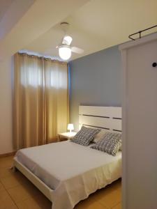 Postel nebo postele na pokoji v ubytování B&B Dalla Nonna