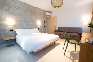 Posteľ alebo postele v izbe v ubytovaní Antica Pusterla Relais de Charme