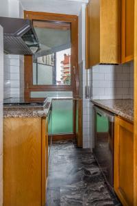 Virtuvė arba virtuvėlė apgyvendinimo įstaigoje Casa da Suite Essenza