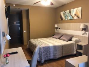 Postel nebo postele na pokoji v ubytování Hotel Bahia