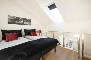 Postel nebo postele na pokoji v ubytování Nordic Host - Tollbugata 13