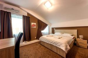 Postel nebo postele na pokoji v ubytování Hotel Oasis