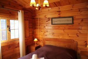 Postel nebo postele na pokoji v ubytování xisto camping
