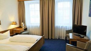 Katil atau katil-katil dalam bilik di Hotel zum Goldenen Ochsen