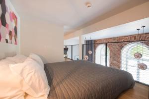 Postel nebo postele na pokoji v ubytování Premium Loft Mere puiestee