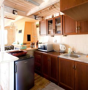 Kuchyň nebo kuchyňský kout v ubytování Rancho-Bierna
