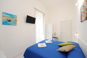 Postel nebo postele na pokoji v ubytování B&B Valentì