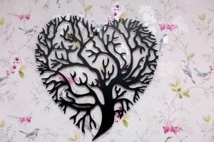 a tree in the shape of a heart with birds at Ceol na Mara Guest House in Tarbert