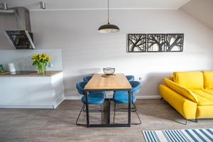 Posedenie v ubytovaní Apartamenty Leśna 1