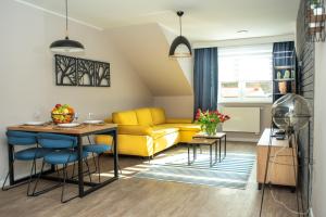 Posedenie v ubytovaní Apartamenty Leśna 1